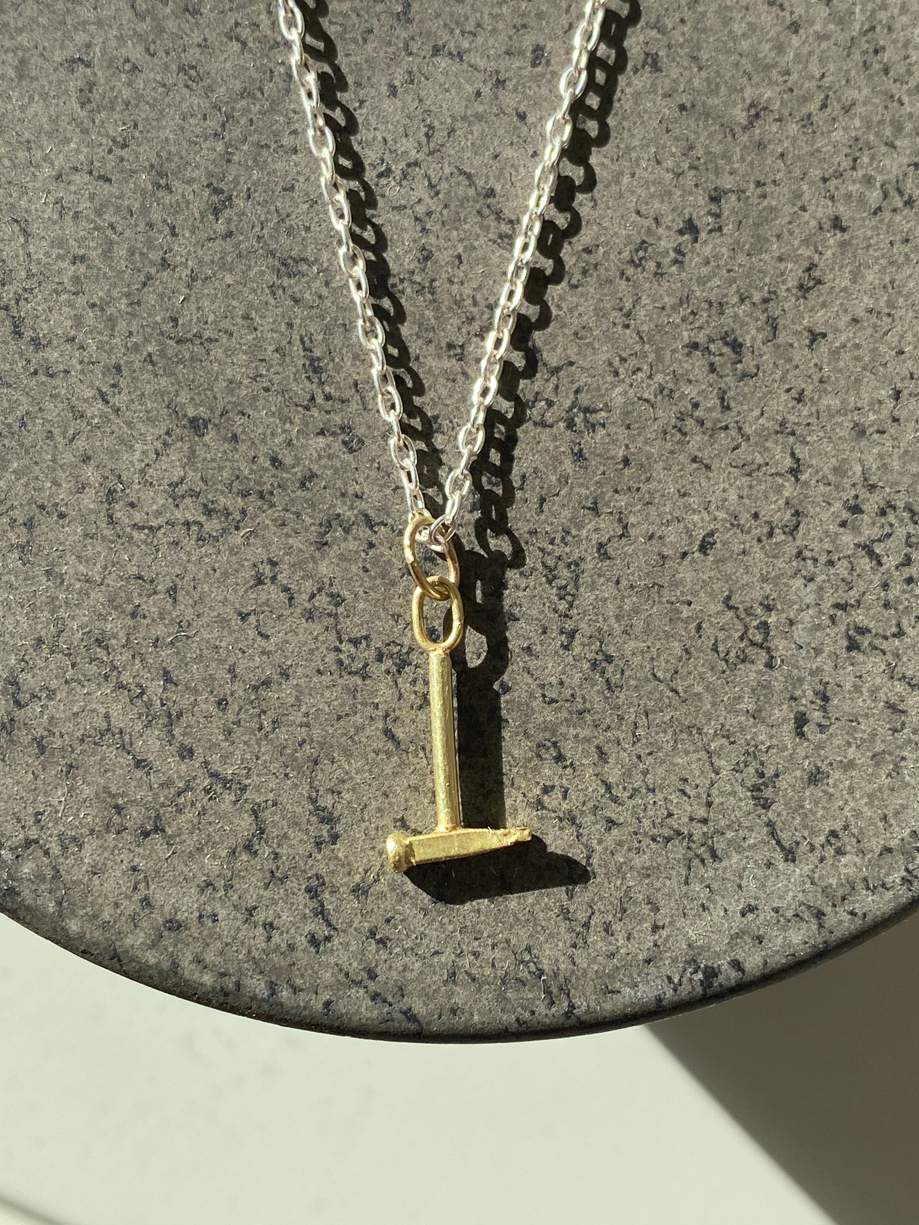 Siedra Loeffler- Teeny Gold Hammer Pendant