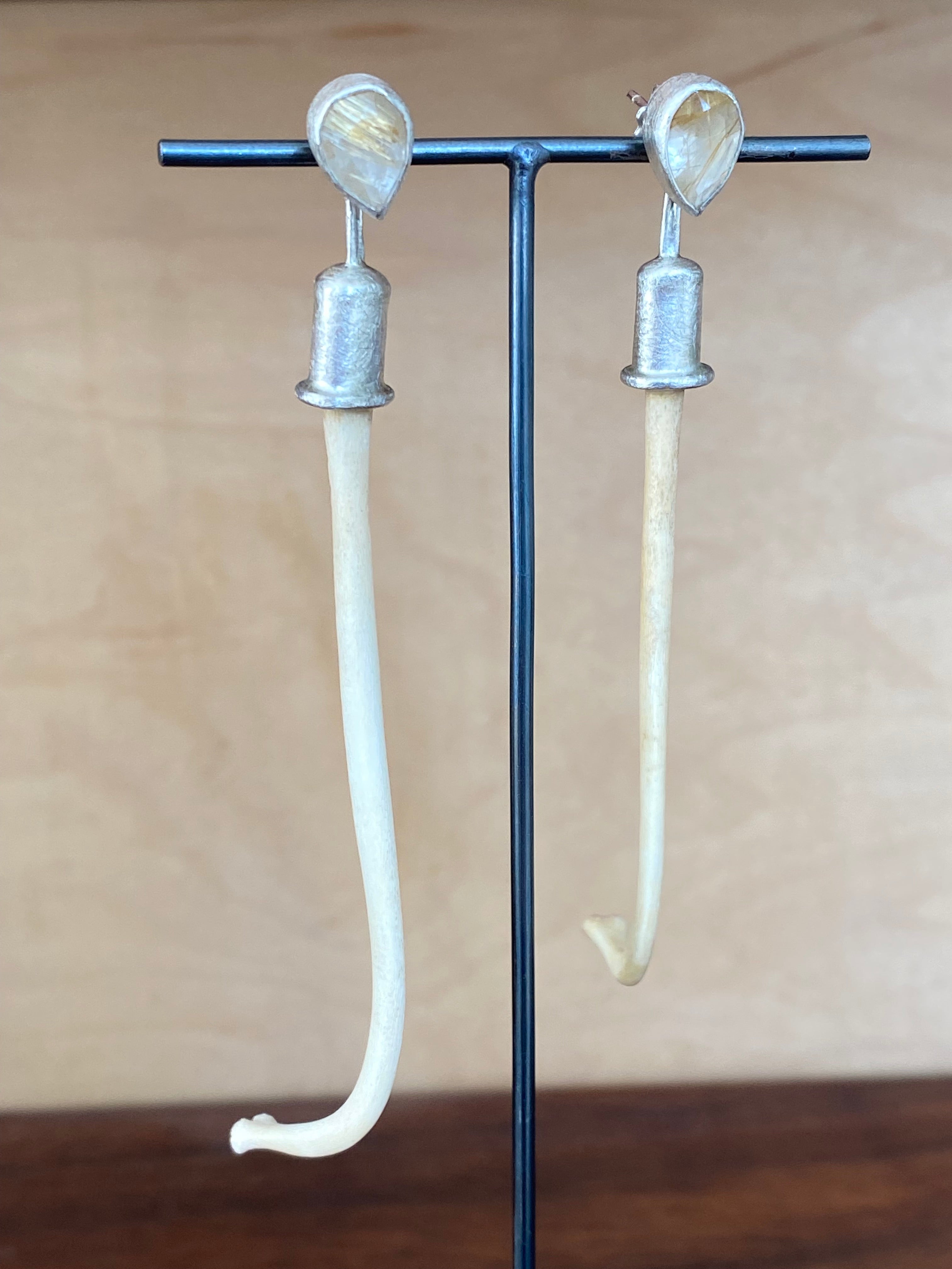 M. Rose Studio- Rutilated Quartz with Raccoon Baculum Jacket Earrings