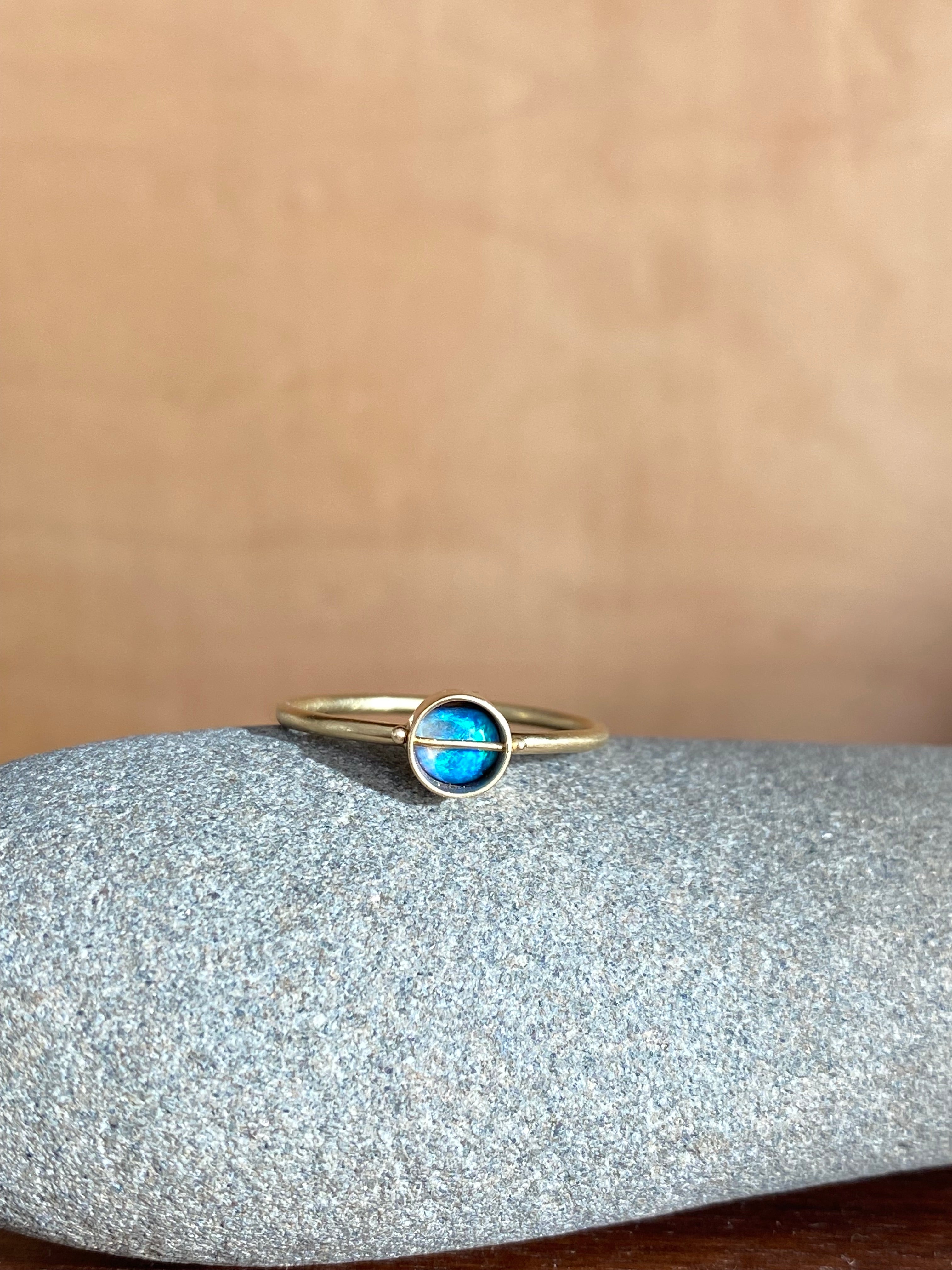 Hilary Finck- Captured Round Ancients17 Opal Ring