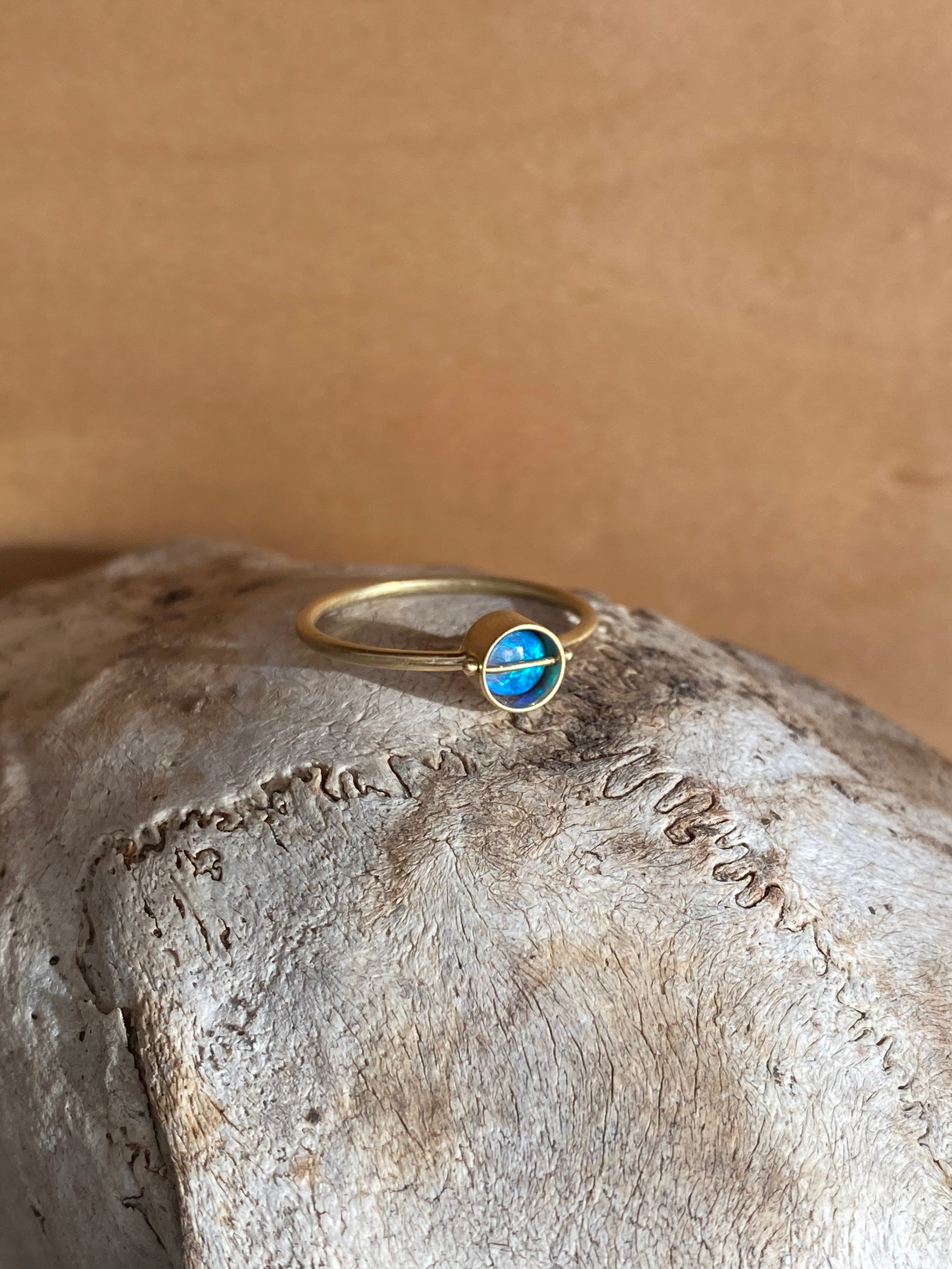 Hilary Finck- Captured Round Ancients17 Opal Ring