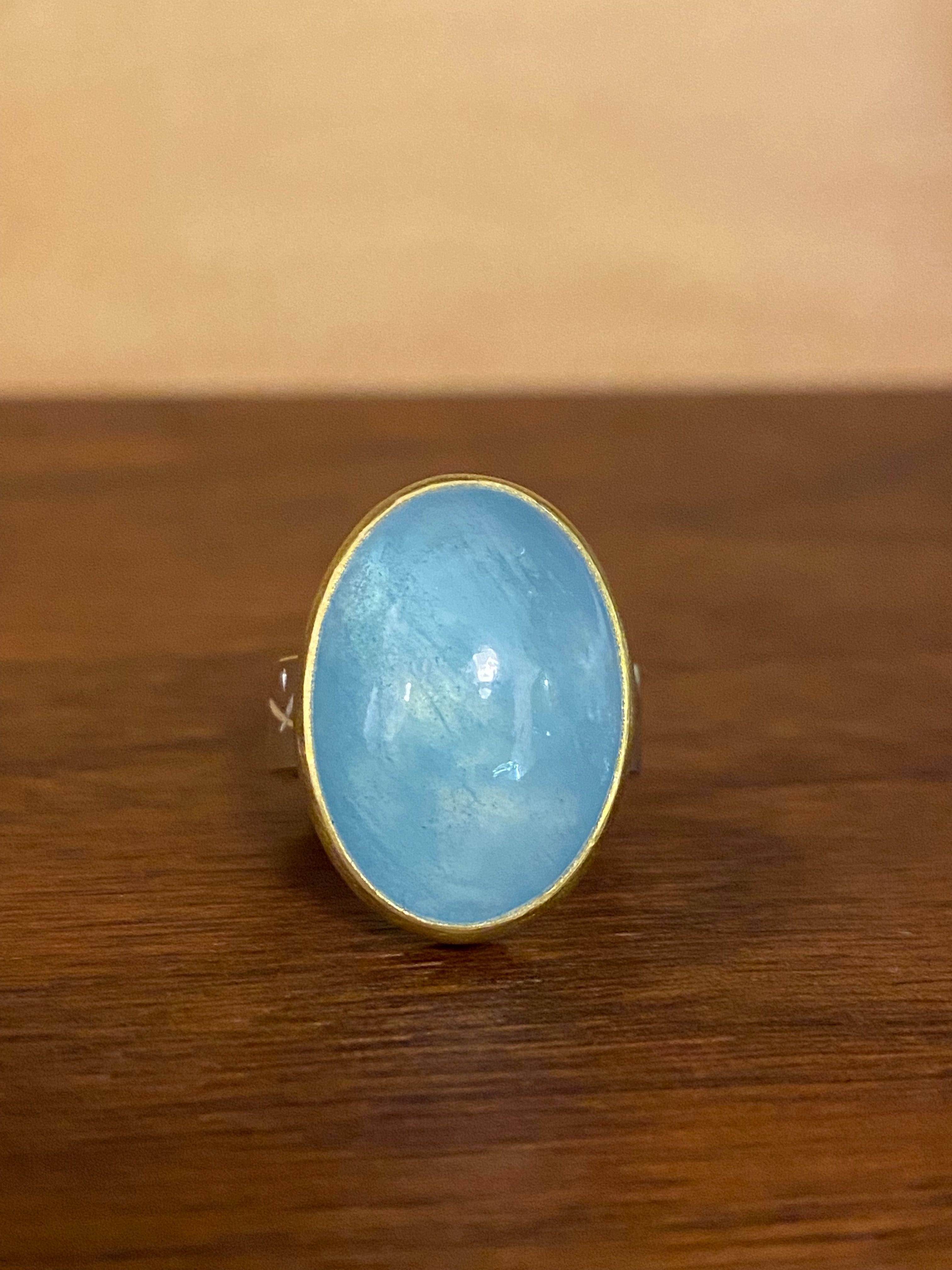Sam Woehrmann- Oval Cabochon Aquamarine Ring with Chased Band