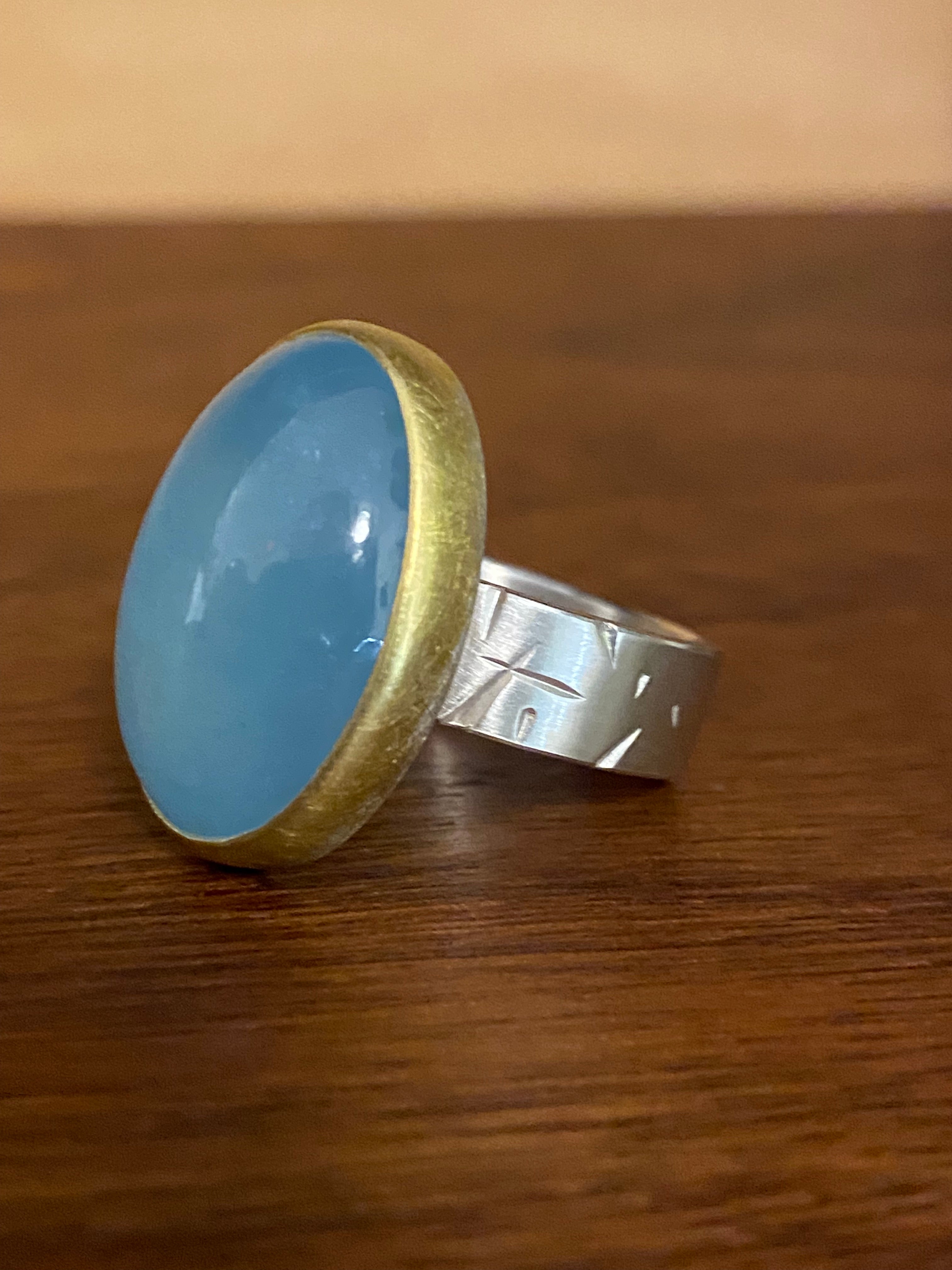 Sam Woehrmann- Oval Cabochon Aquamarine Ring with Chased Band
